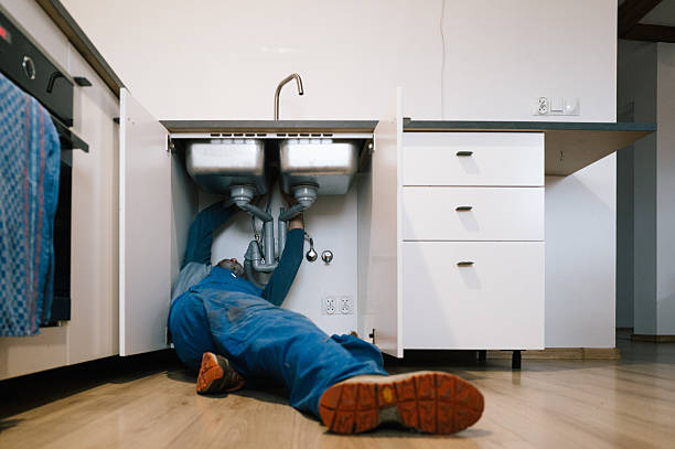 Professional Plumbing technician working in Pine Ridge, FL